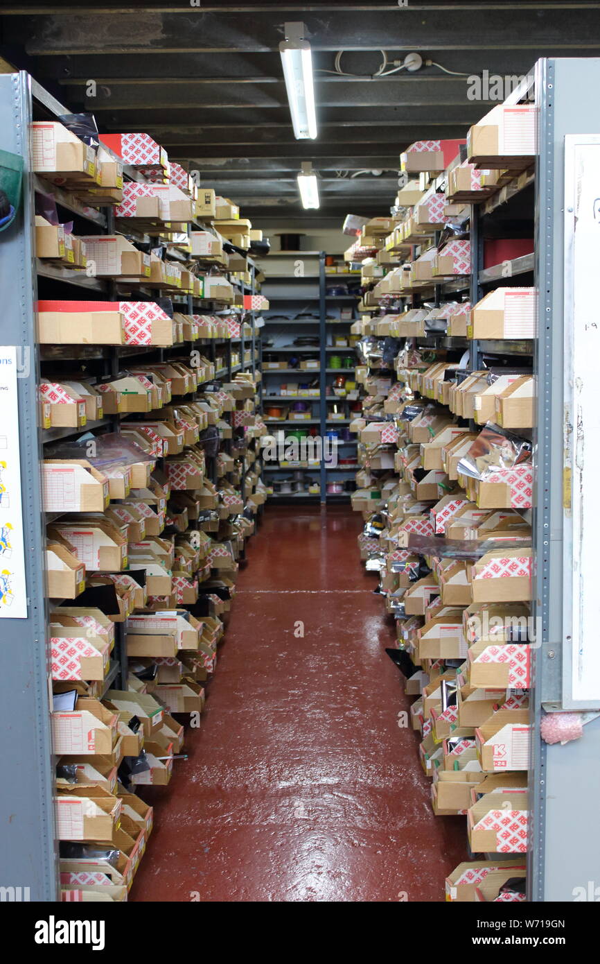 A row in a manufacturing warehouse of the stores department, the