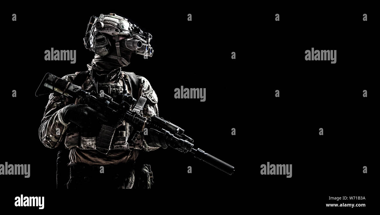 Army special forces shooter low key studio shoot Stock Photo