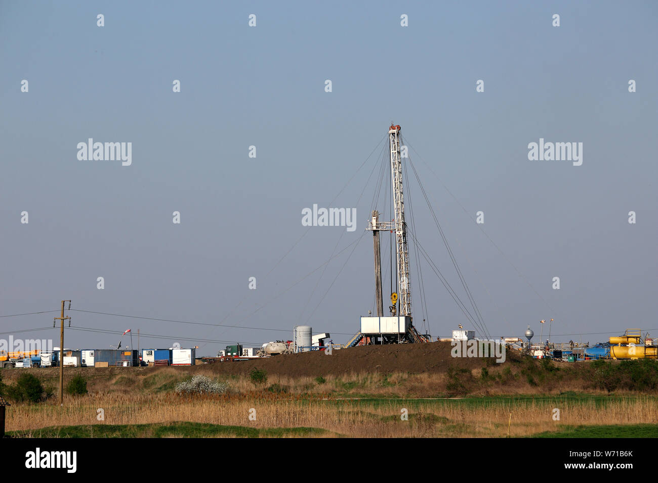 land oil and gas drilling rig in oilfield industry Stock Photo