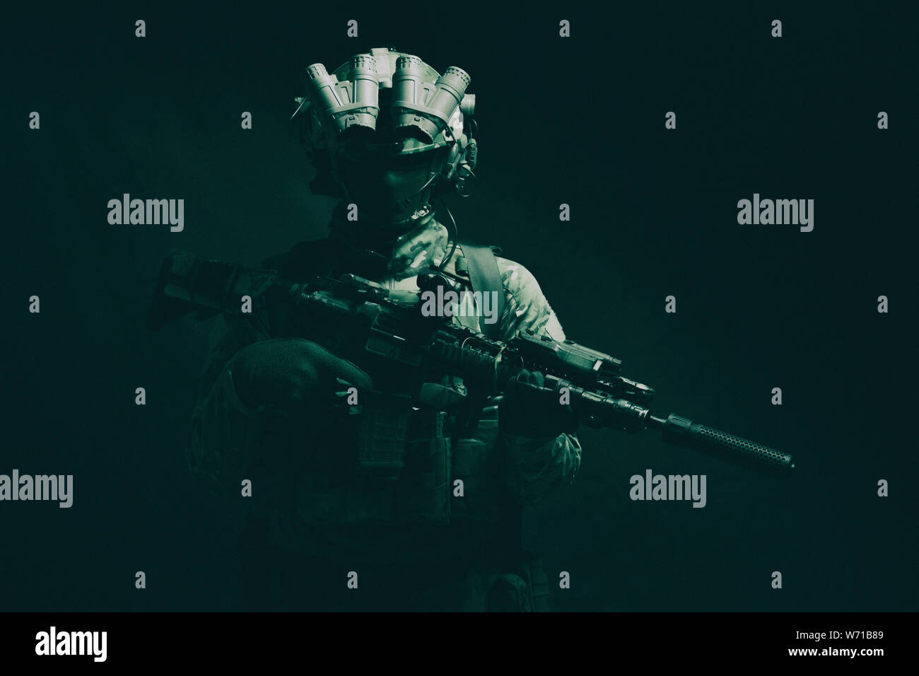 Army special forces fighter low key studio shoot Stock Photo