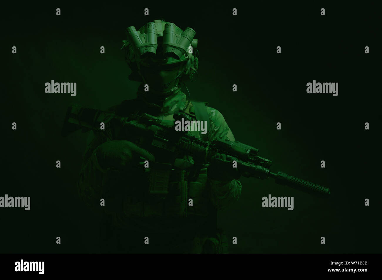 Army special forces fighter low key studio shoot Stock Photo