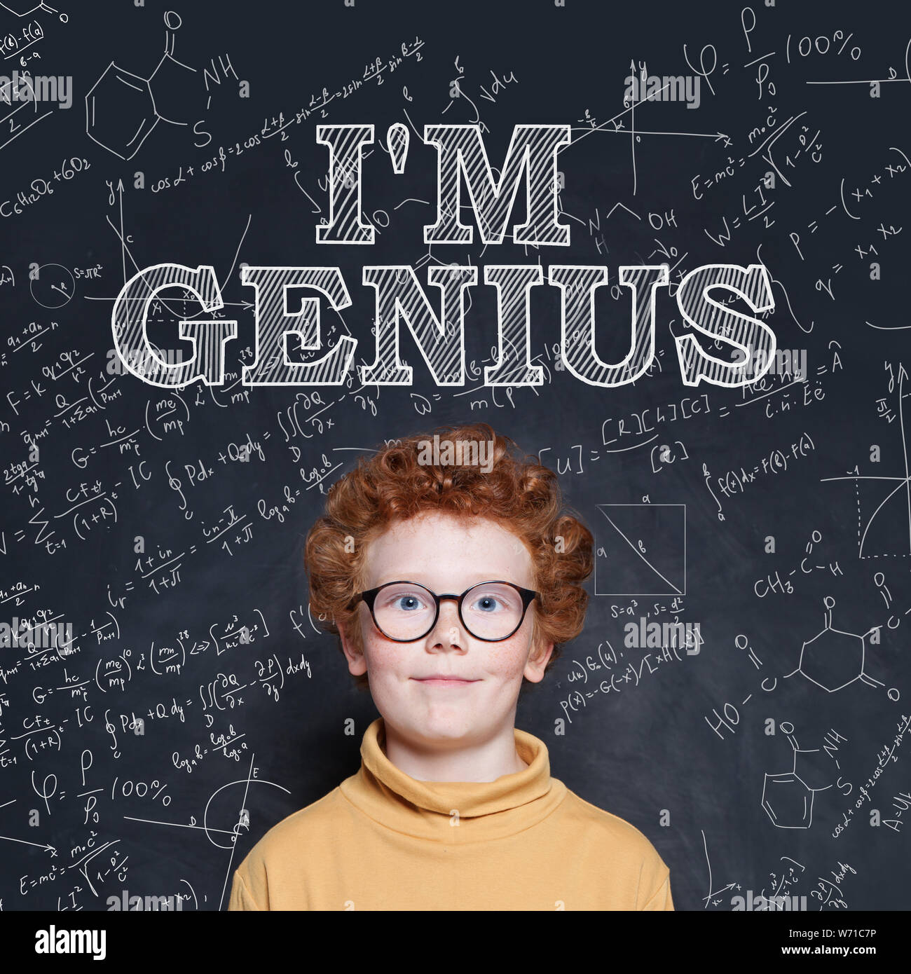 Cute kid boy in glasses on science background Stock Photo