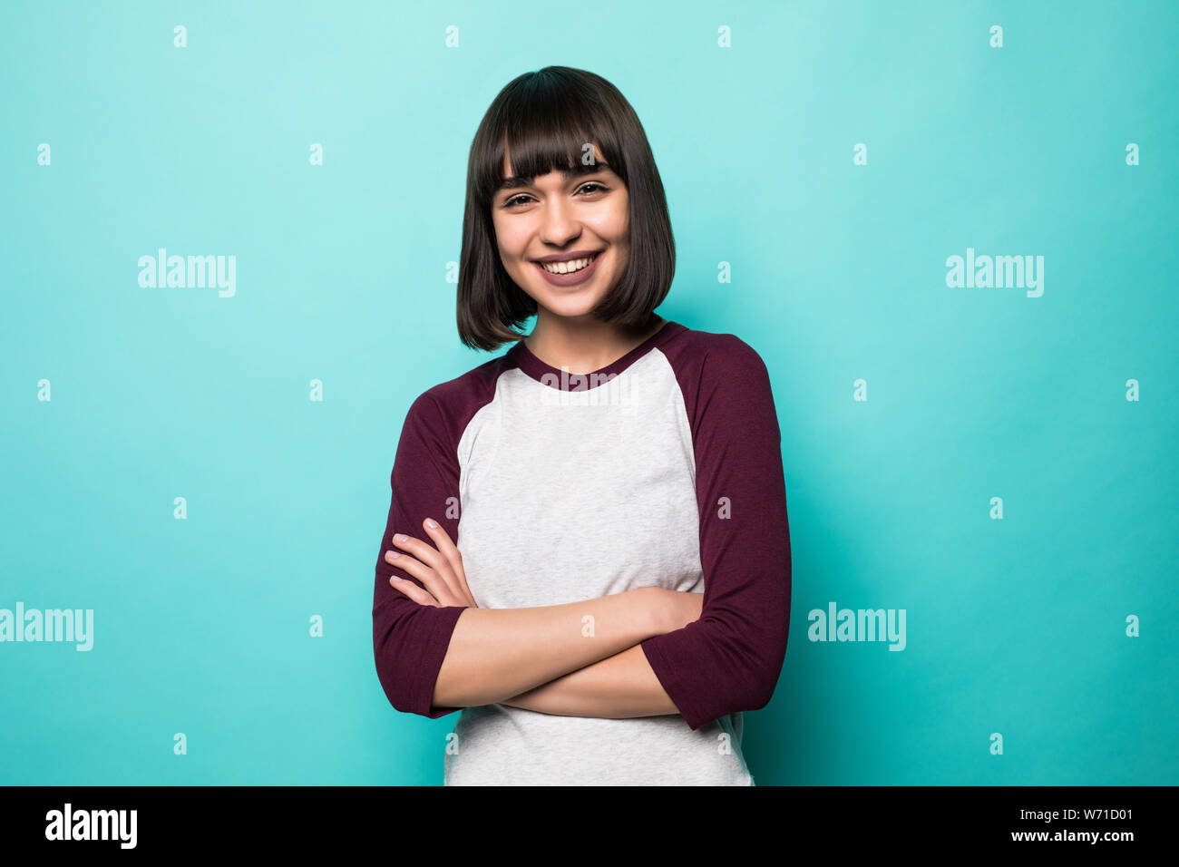 portrait of the beautiful young woman on the green background Stock ...