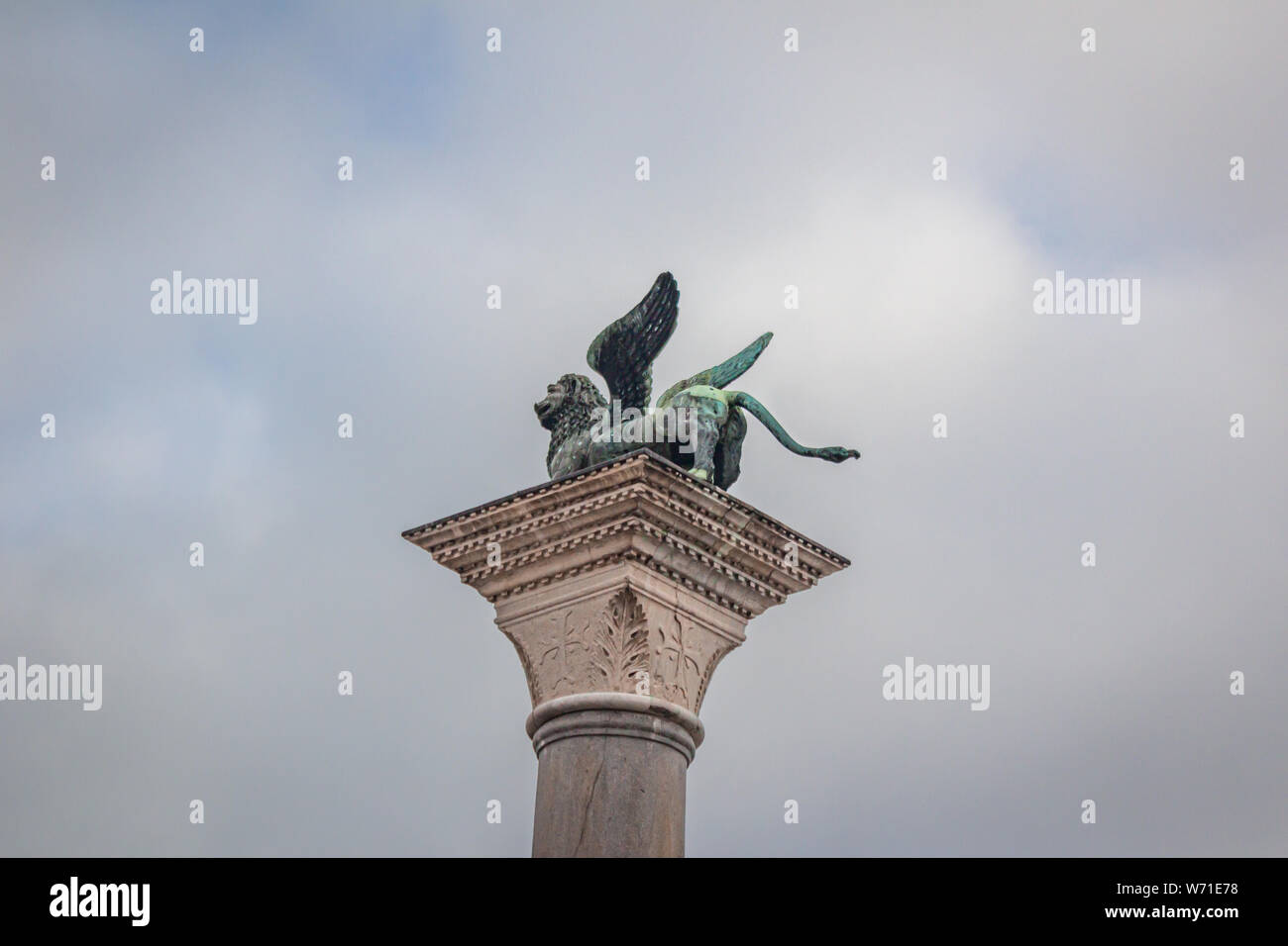 The Lion of Venice is an ancient bronze winged lion sculpture in the Piazza San Marco of Venice, Italy Stock Photo