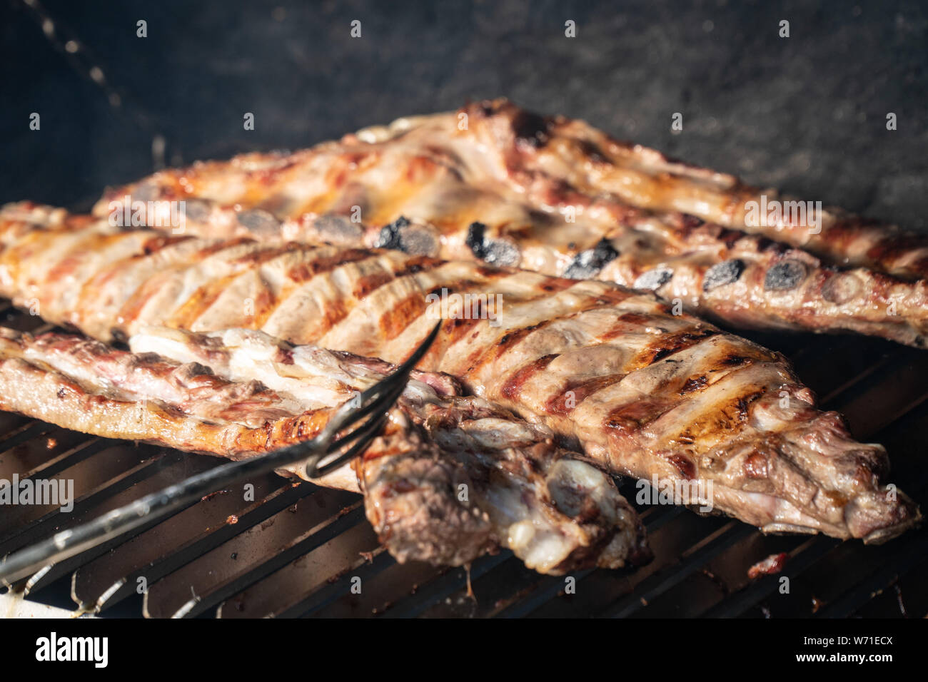 Barbecue grill with grilled pork ribs. Spanish churrasco Stock Photo