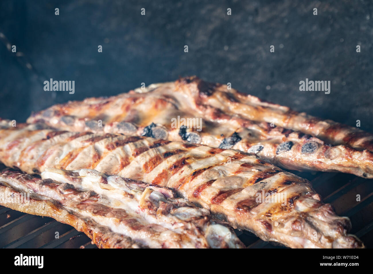 Barbecue grill with grilled pork ribs. Spanish churrasco Stock Photo Alamy