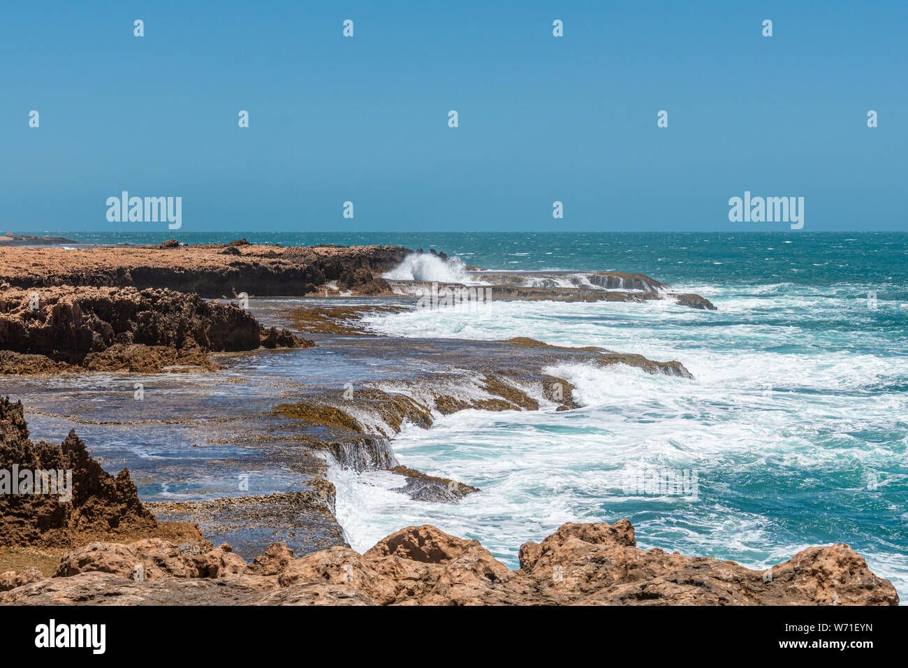 Quobba Blow Holes waves and spray during windy weather in Australia