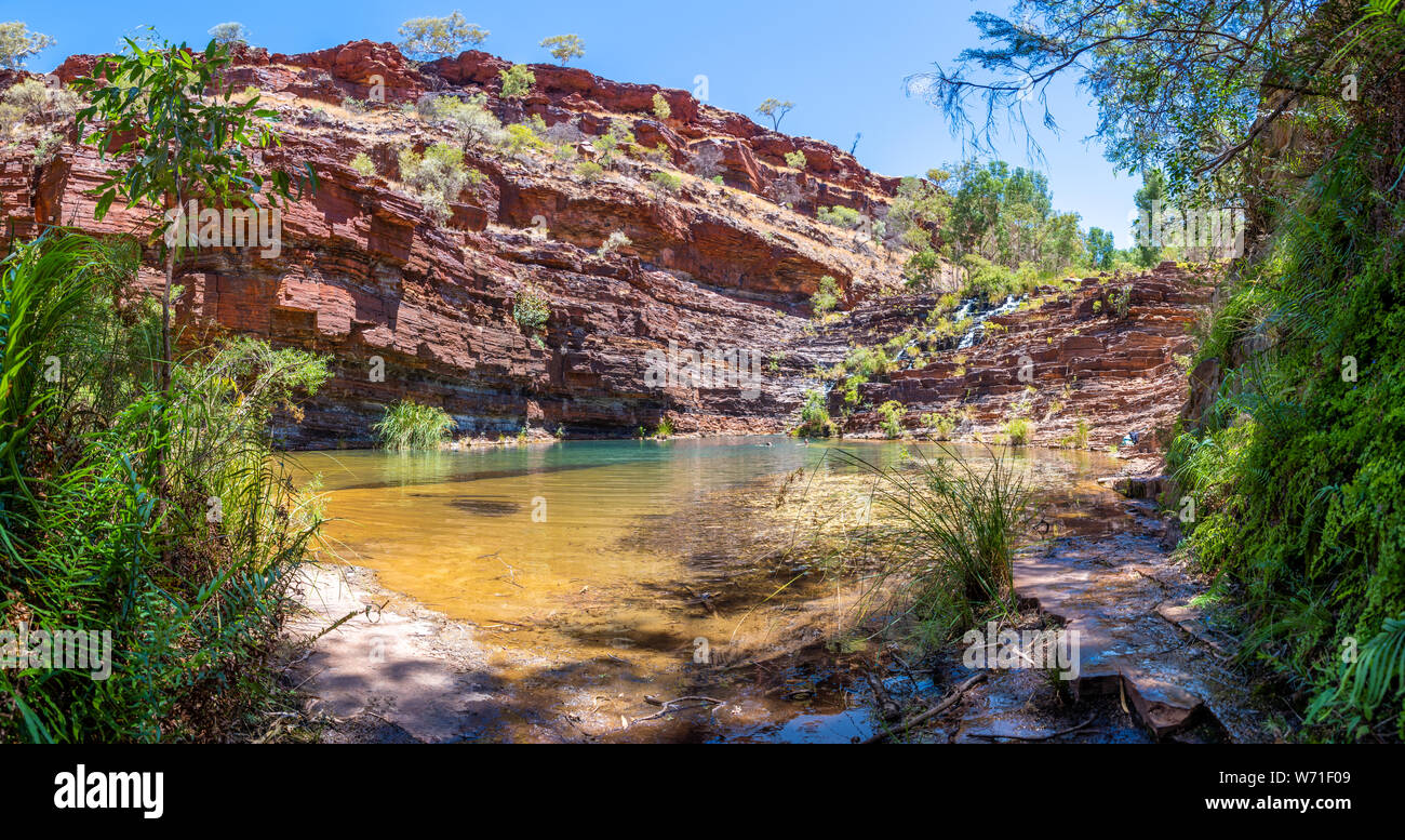 Panorama of Fortescue Falls and pool at the bottom of Dales Gorge at Karijini National Park Australia Stock Photo