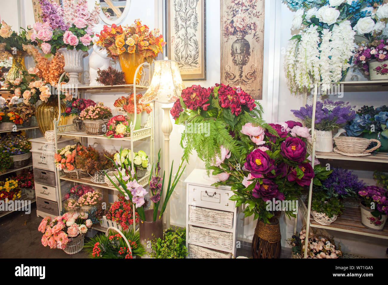 collection of beautiful floral bouquets and plants in flower shop Stock