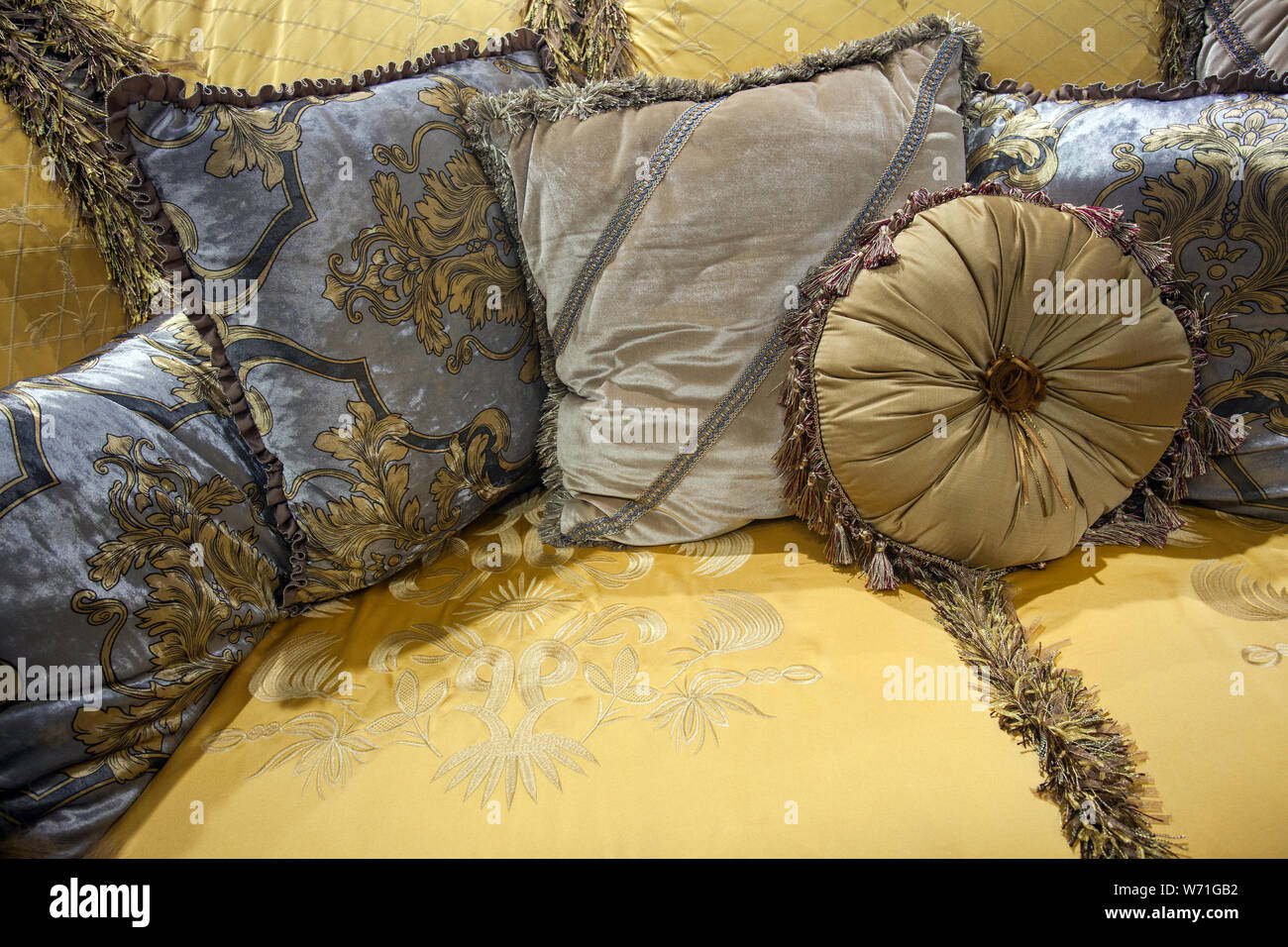 beautiful decorative pillows on sofa, close-up Stock Photo