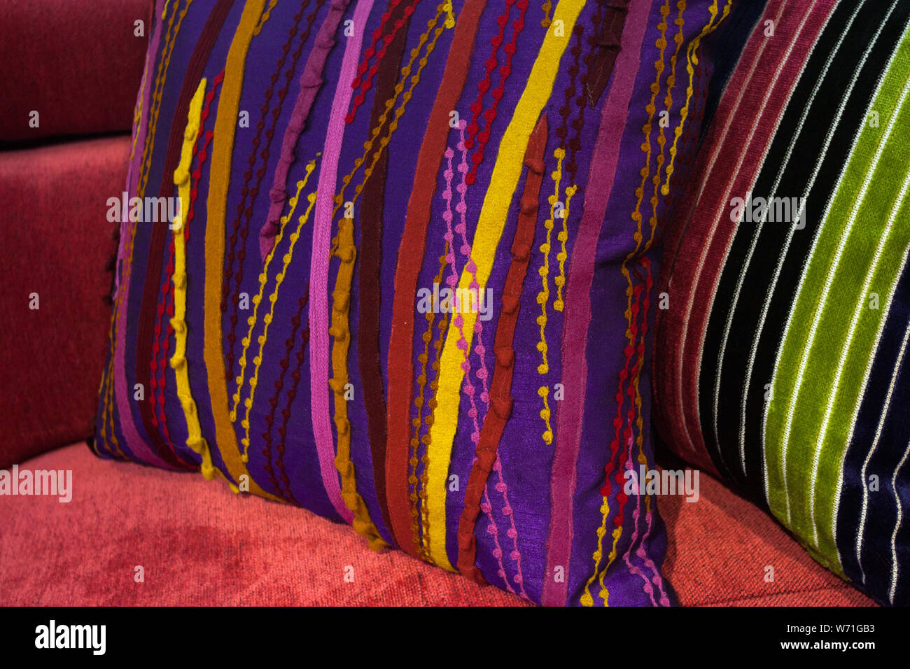 beautiful decorative pillows on sofa, closeup Stock Photo