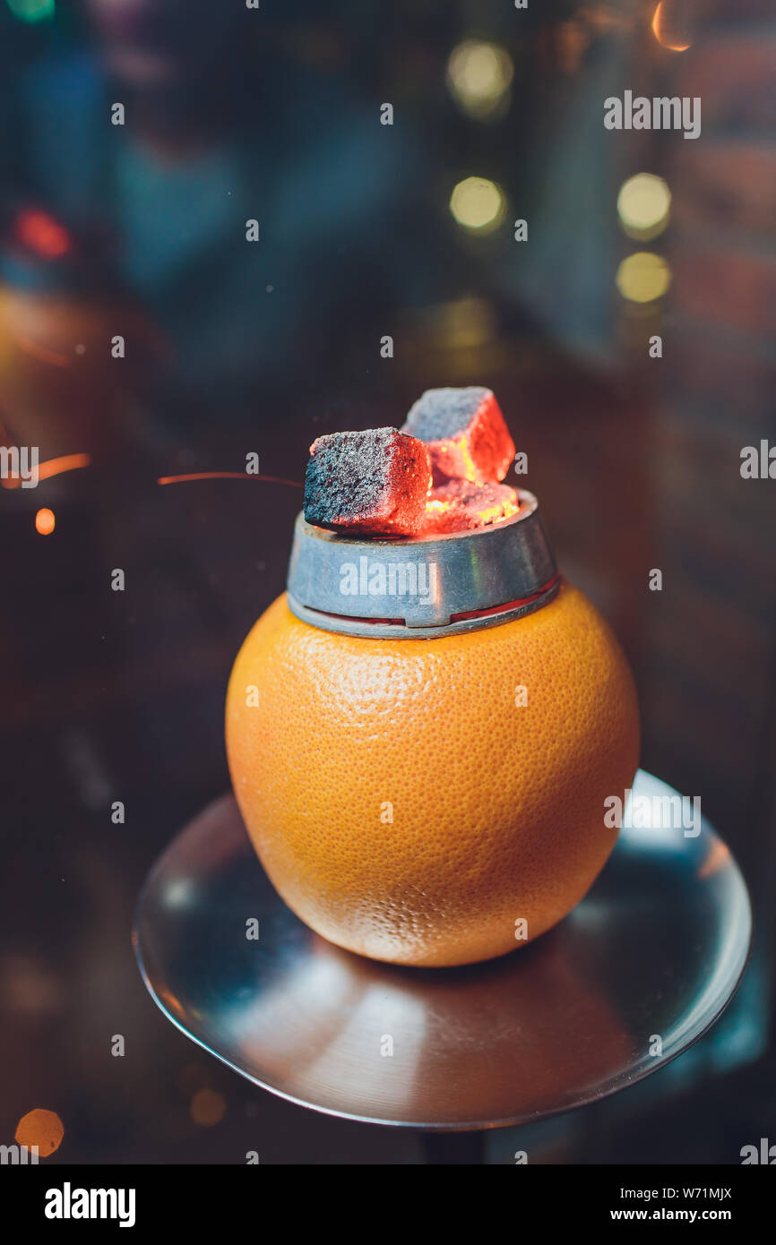 Stylish hookah with aroma grapefruit for relax. grapefruit shisha