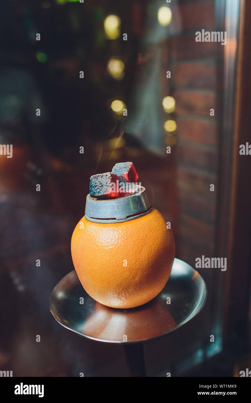 Stylish hookah with aroma grapefruit for relax. grapefruit shisha