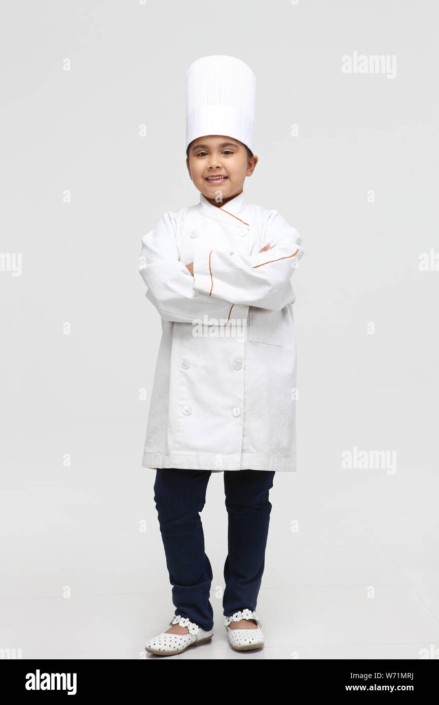 Girl pretending to be a chef Stock Photo