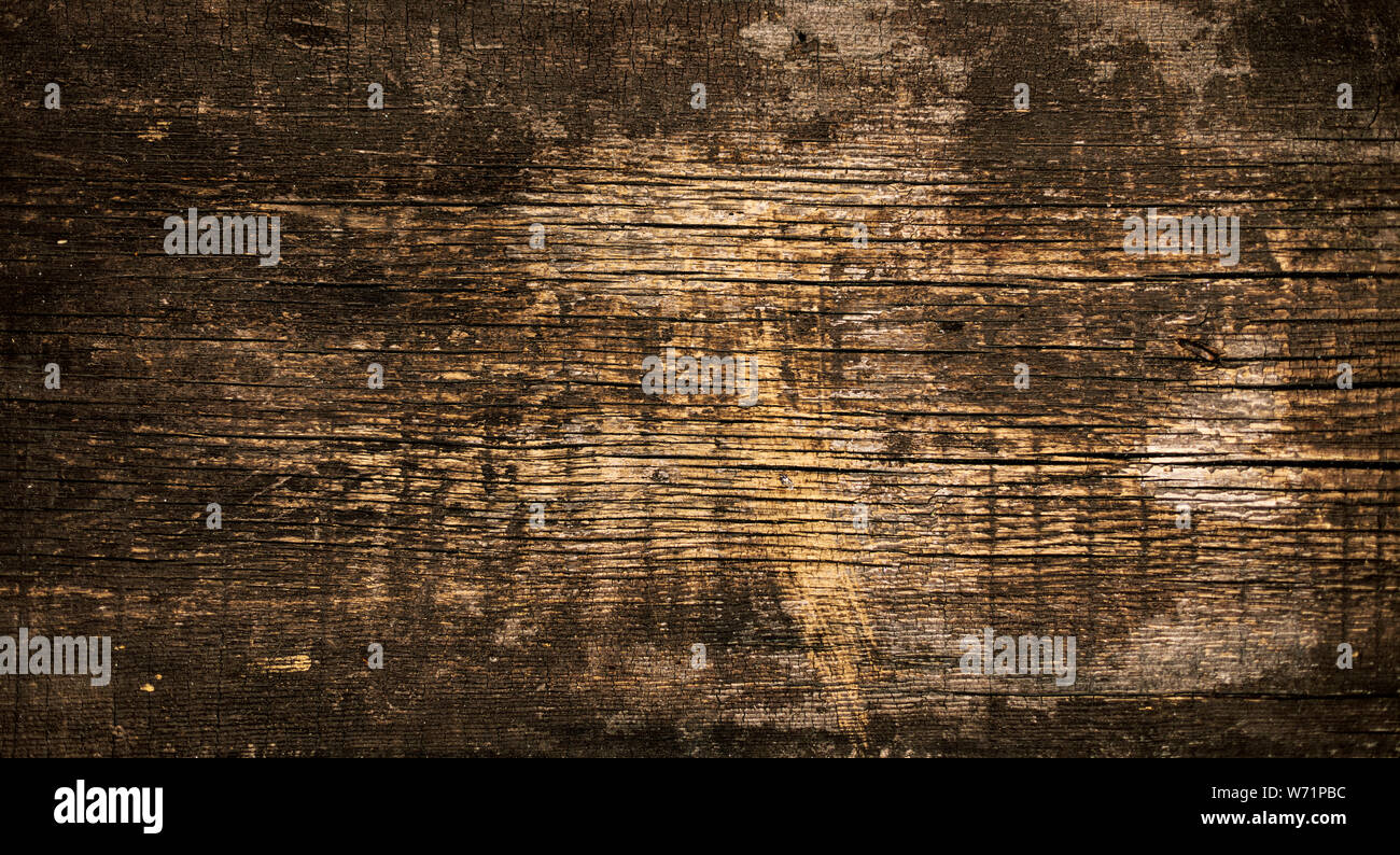 Old dark shabby boards with rusty nails. Selective focus. Stock Photo