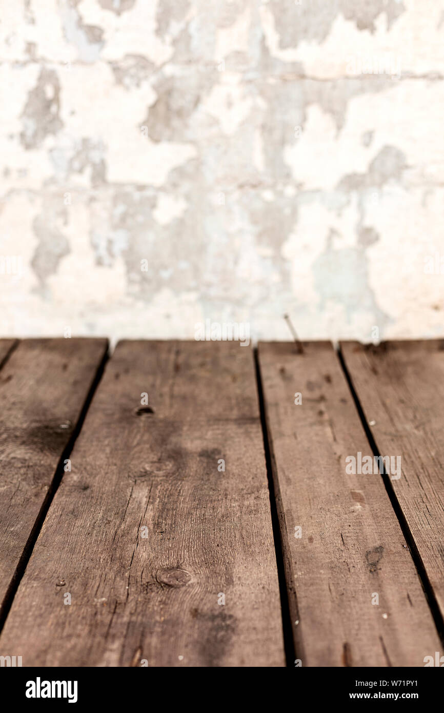 Old dark shabby boards with rusty nails. Selective focus. Stock Photo