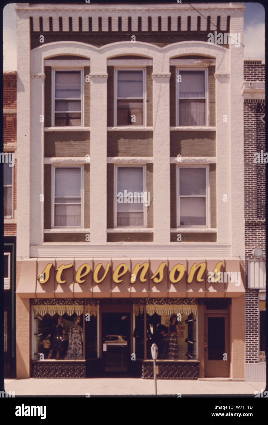 A NEWLY RESTORED AND PAINTED OLDER STOREFRONT ON MINNESOTA STREET IN