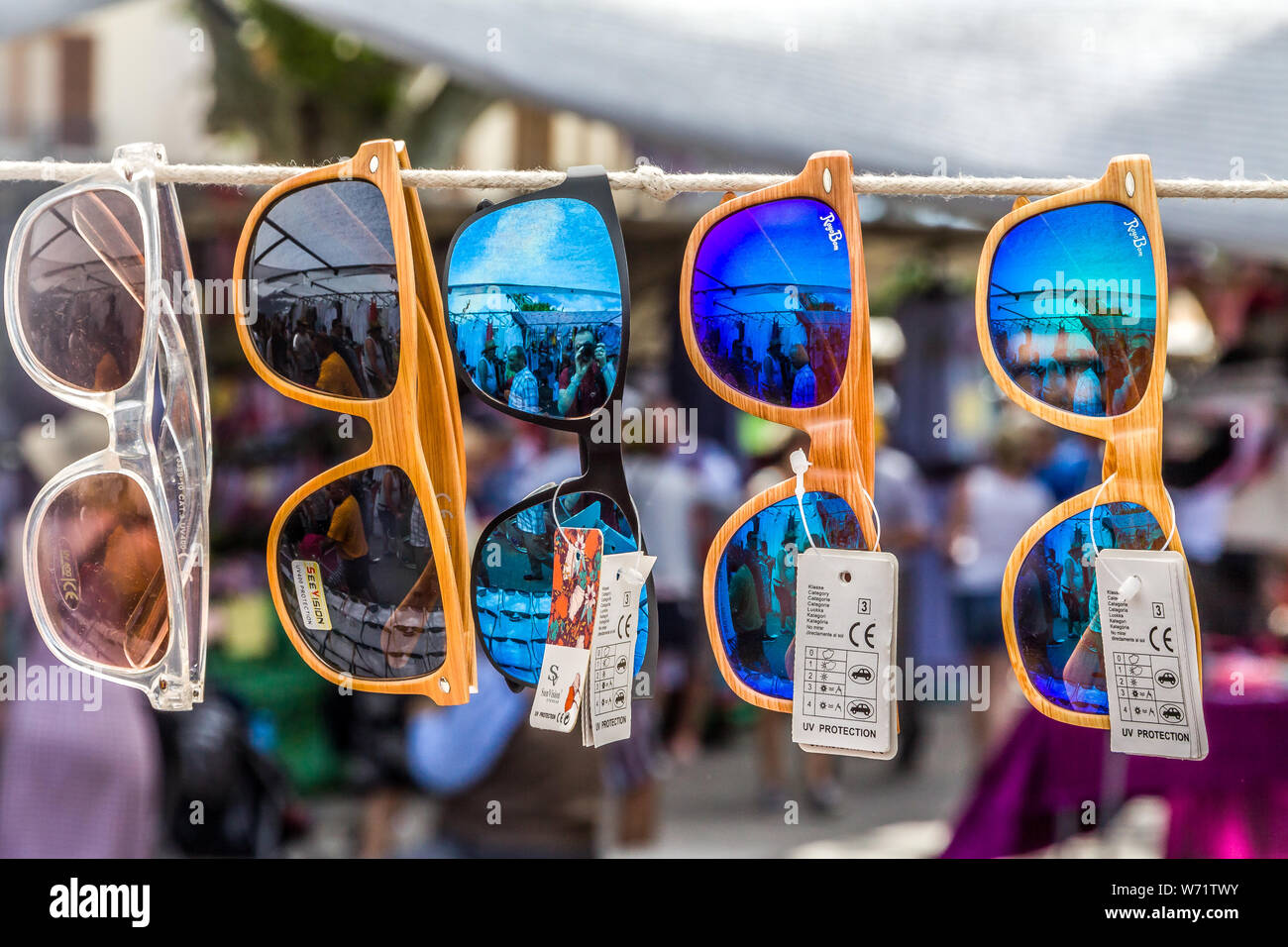 Different sunglasses on market Stock Photo