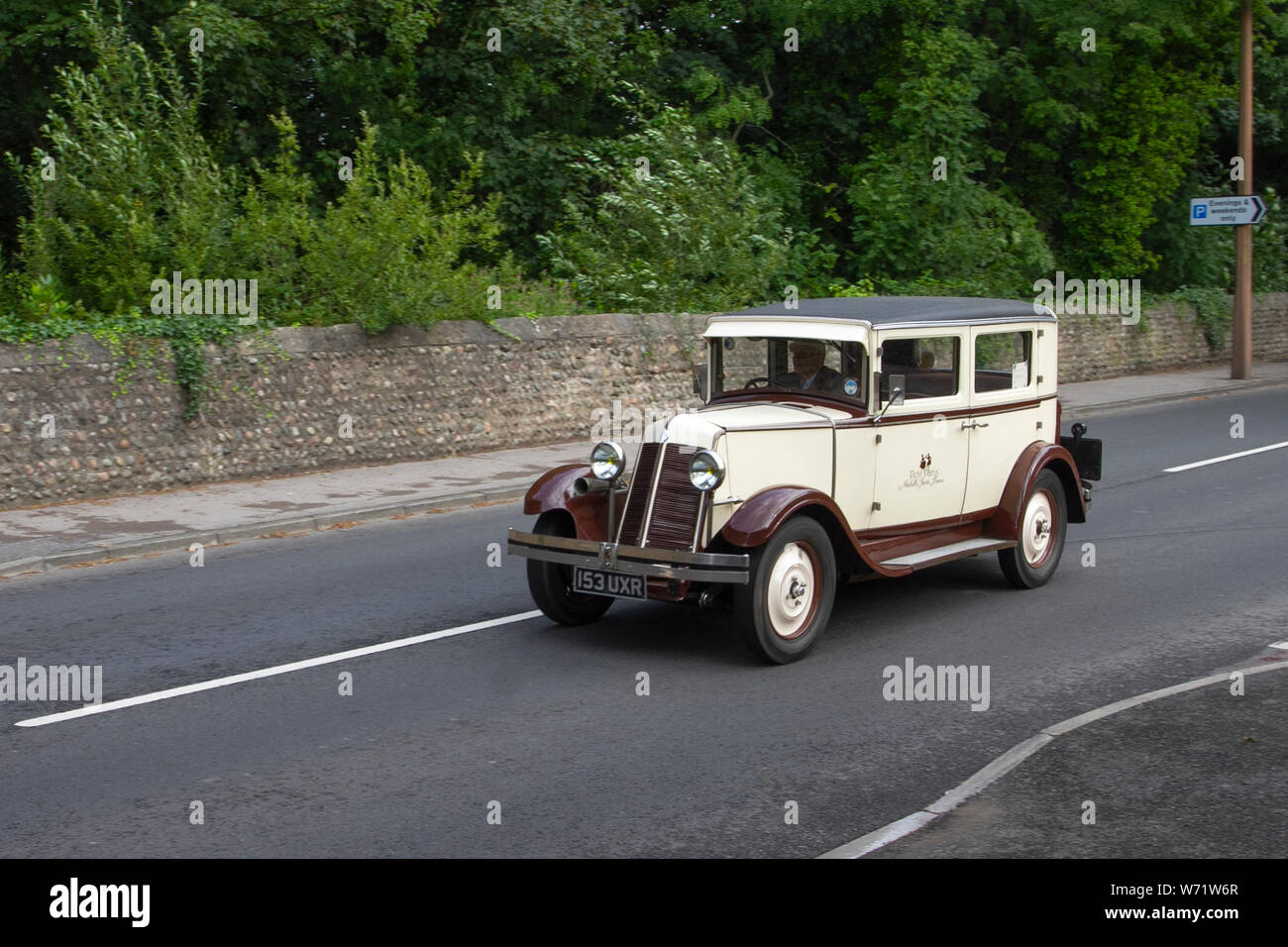 1931 30s sedan French cream & brown Renault Monasix 1474cc sedan vehicle en-route to Lytham Hall classic vintage collectable transport festival vehicles show. The Festival of Transport will see a diverse range of 30s classic, vintage and prestige vehicles on display. Stock Photo