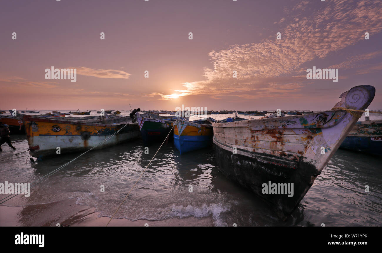 Traditional fishing boats on the beach at sunset in Pamban near Rameswaram, Tamil Nadu, India Stock Photo