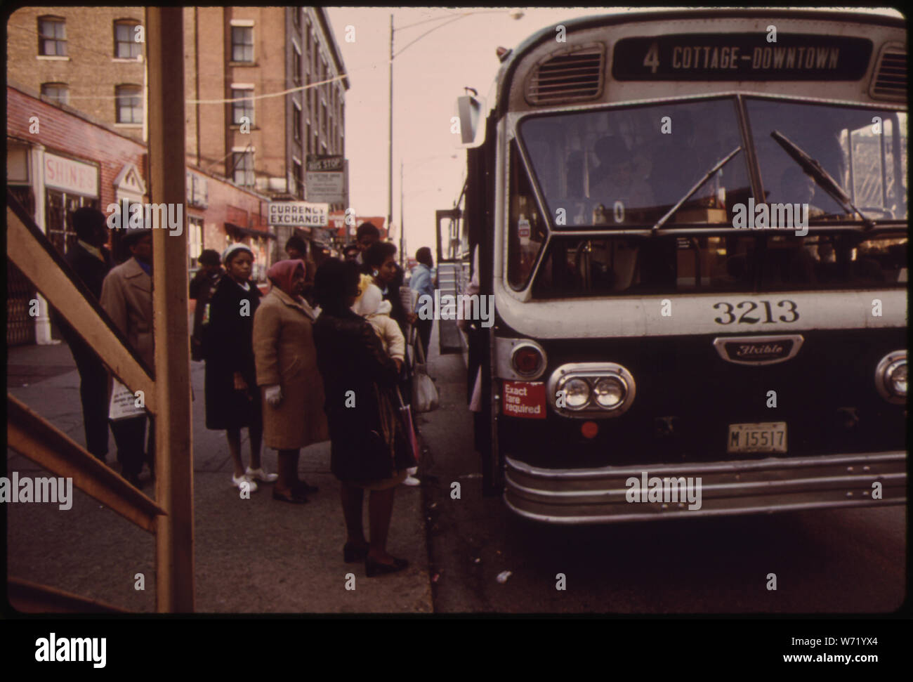 BLACKS USING BUS TRANSPORTATION ON 63RD STREET IN CHICAGO DURING 1973