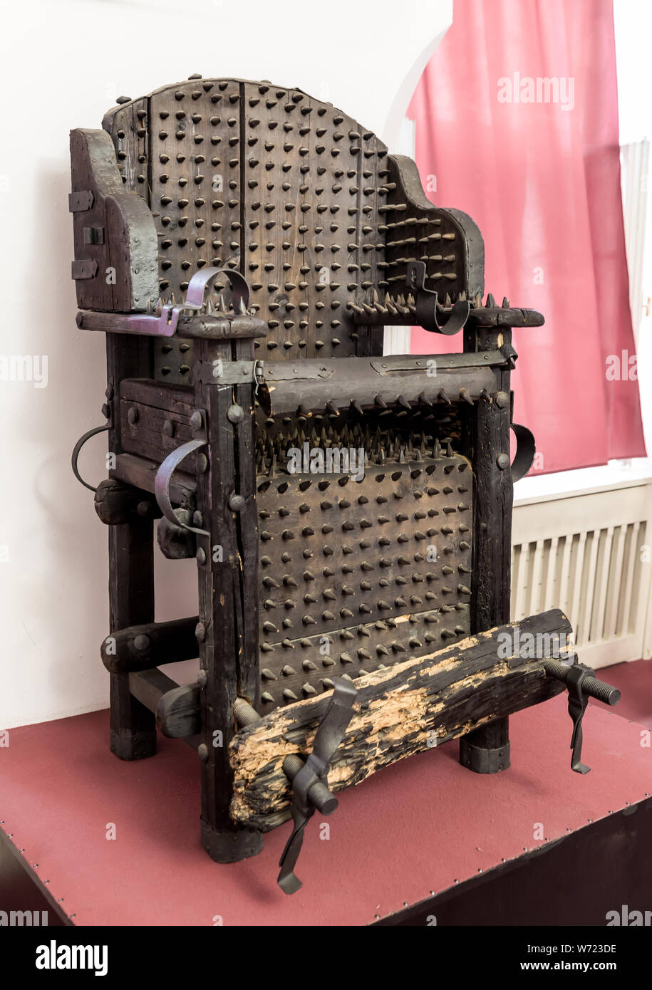 Torture chair with thorns, museum in Prague Stock Photo Alamy