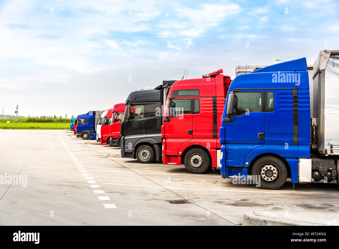 Trucks on parking, cargo transportation in Europe Stock Photo