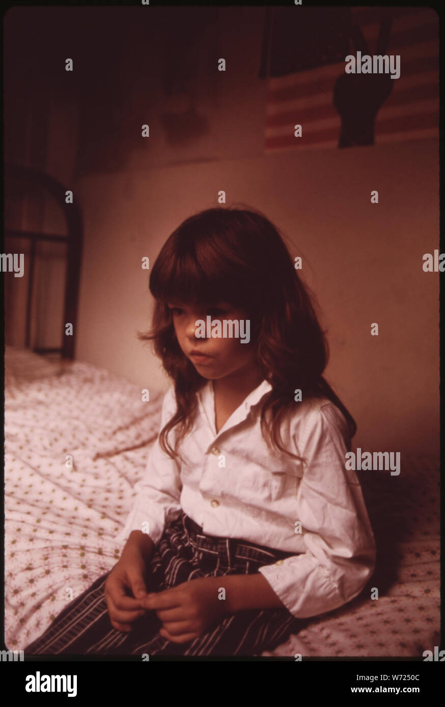 DIANE WATKINS, 9, IN BEDROOM OF HER FAMILY’S HOUSE IN MULKY SQUARE