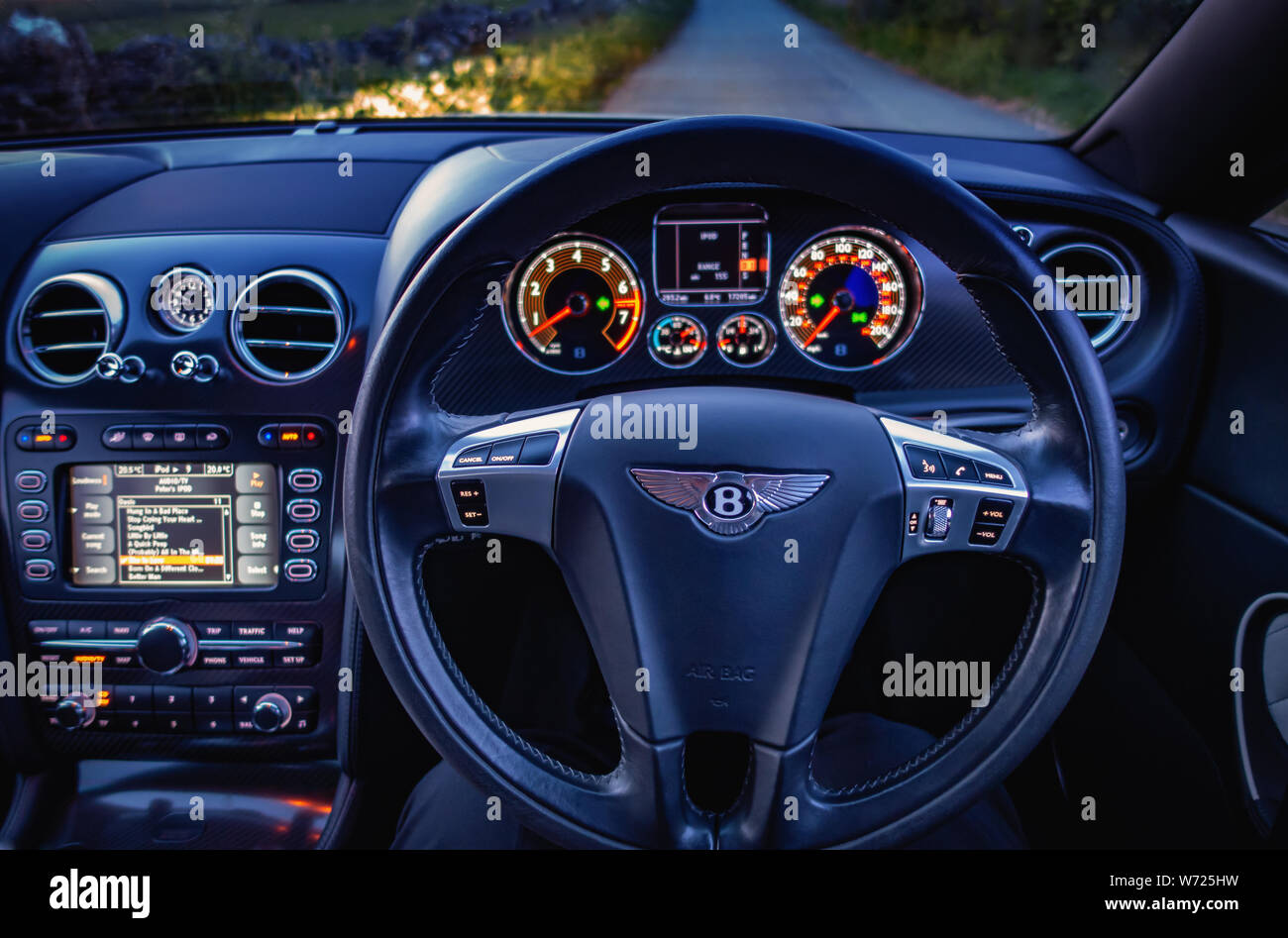 Steering wheel and dashboard of a Bentley Continental GTC Supersport car Stock Photo