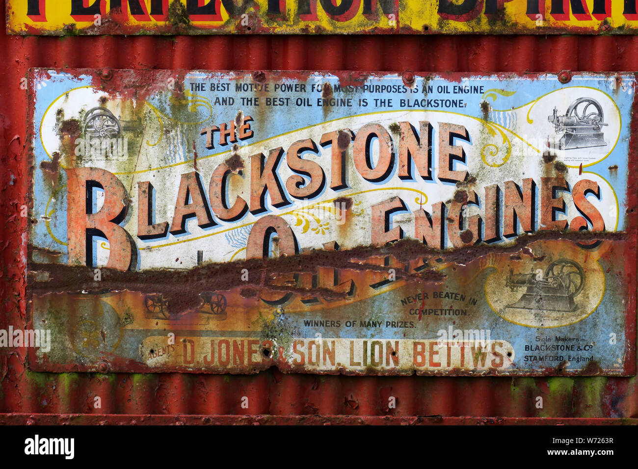 Enameled metal advertising boards or signs from a bygone era with