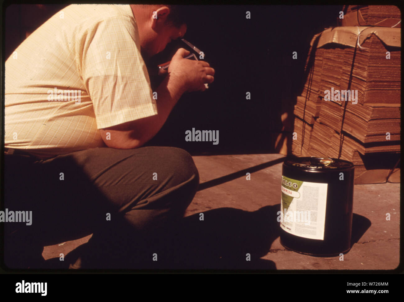 ENVIRONMENTAL PROTECTION AGENCY PESTICIDES INSPECTOR PHOTOGRAPHS THE