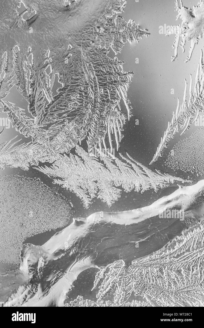 Frosty pattern at a winter window glass Stock Photo - Alamy