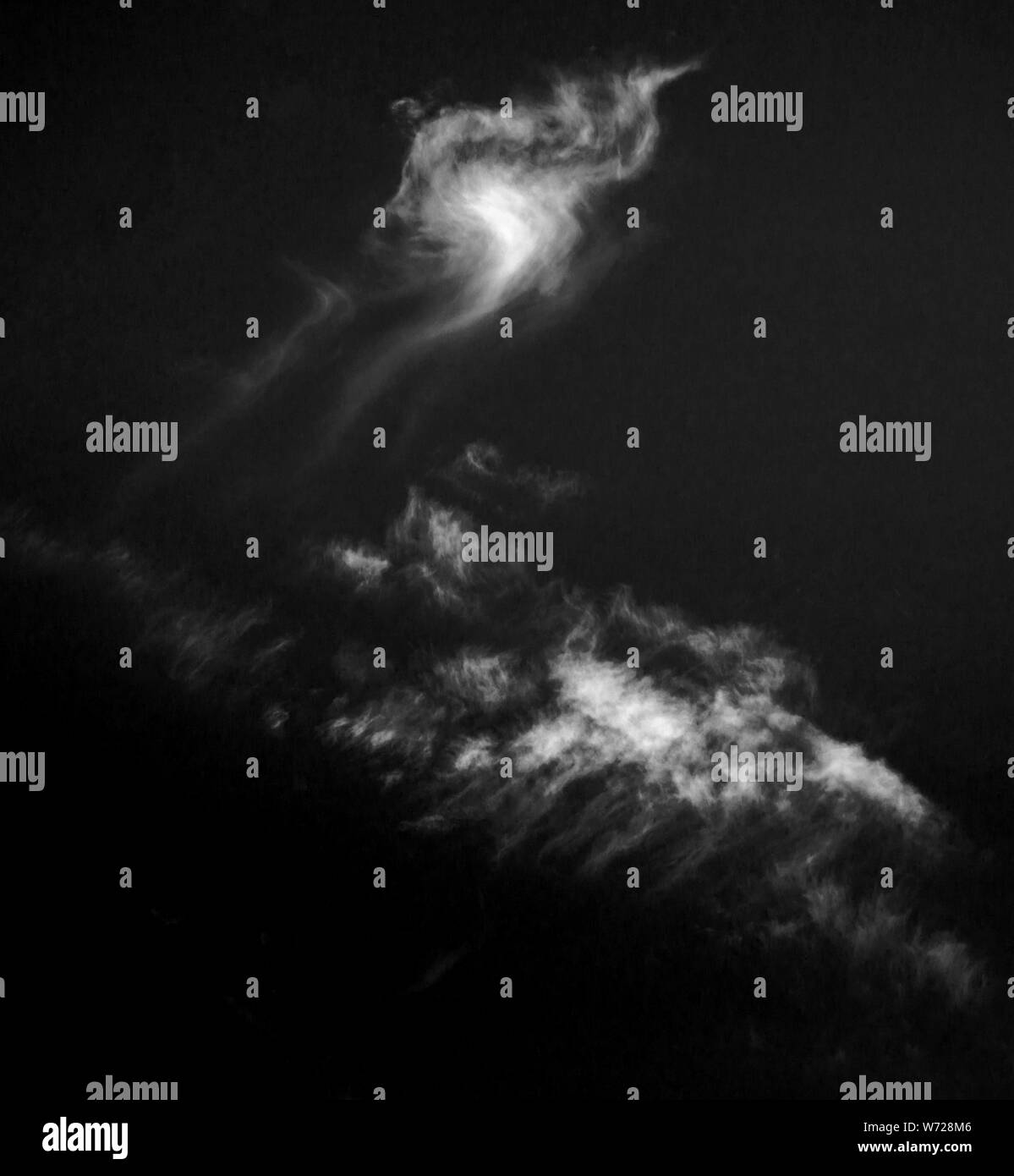 Blue sky clouds condensation Black and White Stock Photos & Images - Alamy