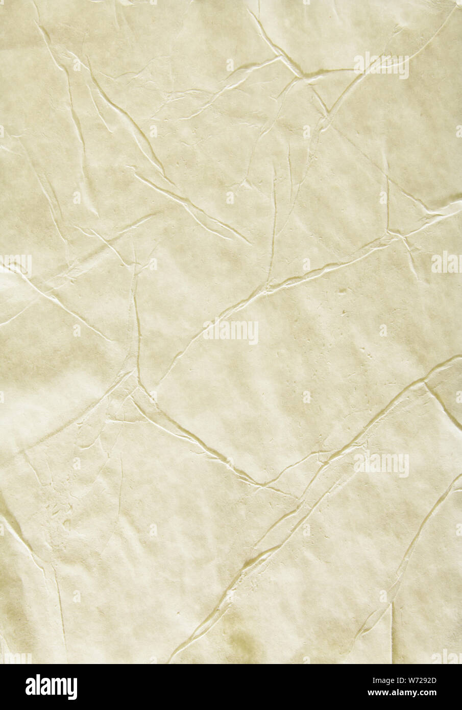 Old sheet of paper folded and battered, with paper texture Stock Photo