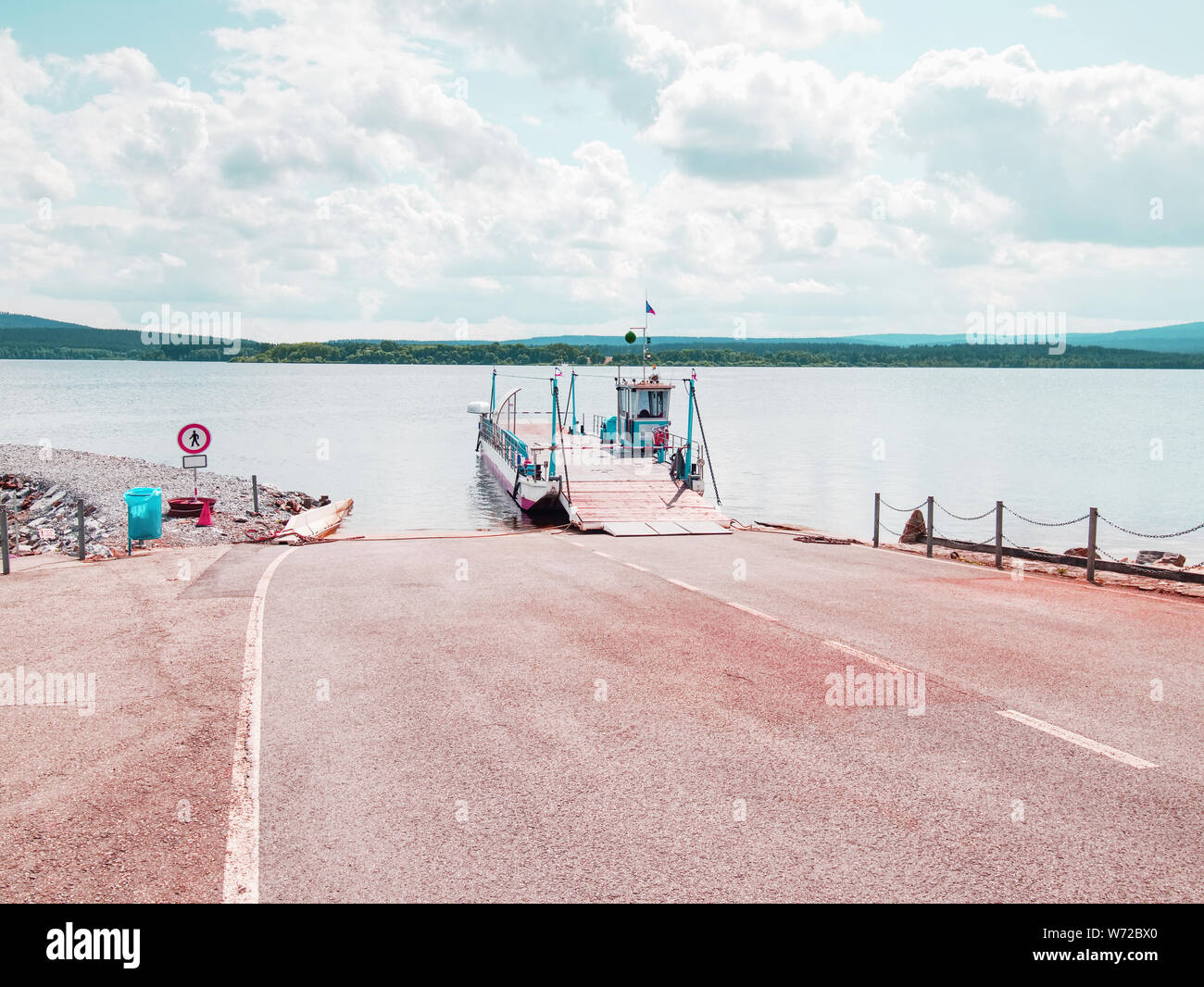 Shipping on Ferry Boat Ship with open Ramp and empty Car Deck. Wooden board for cars and passenger Stock Photo