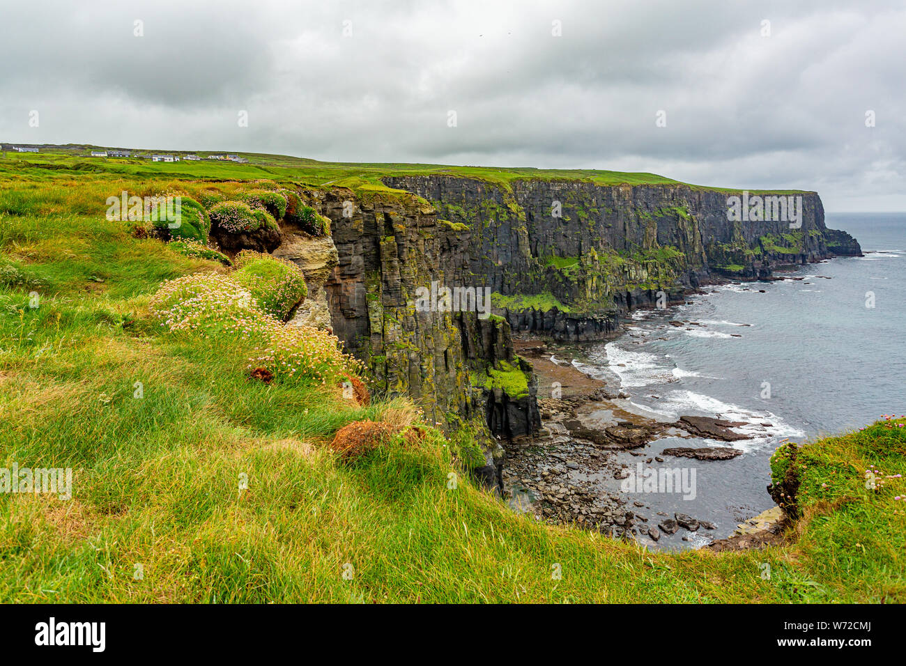 View of the Irish countryside and rocky cliffs along the coastal walk