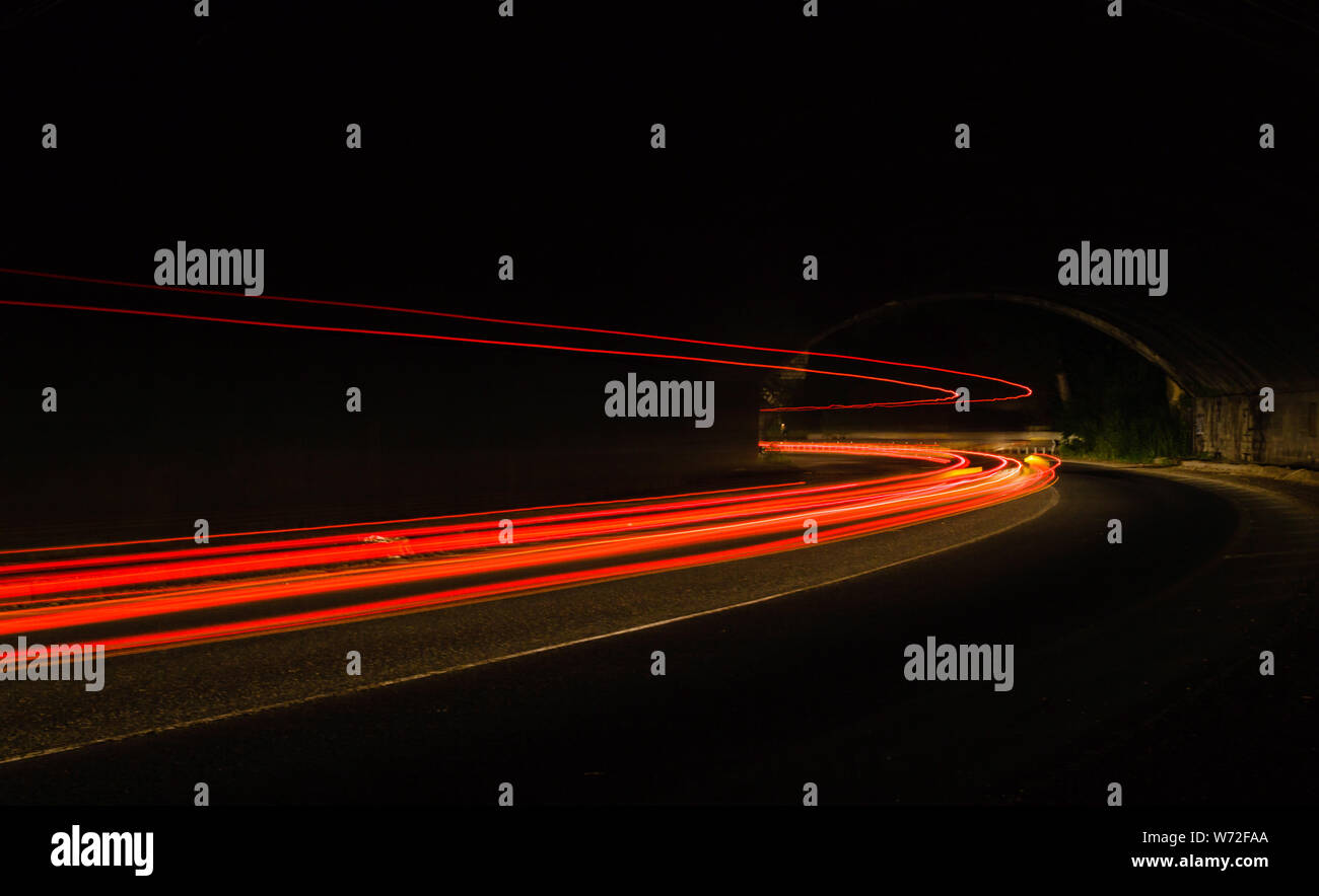 Car light trails in the tunnel. Long exposure photo taken in a tunnel ...