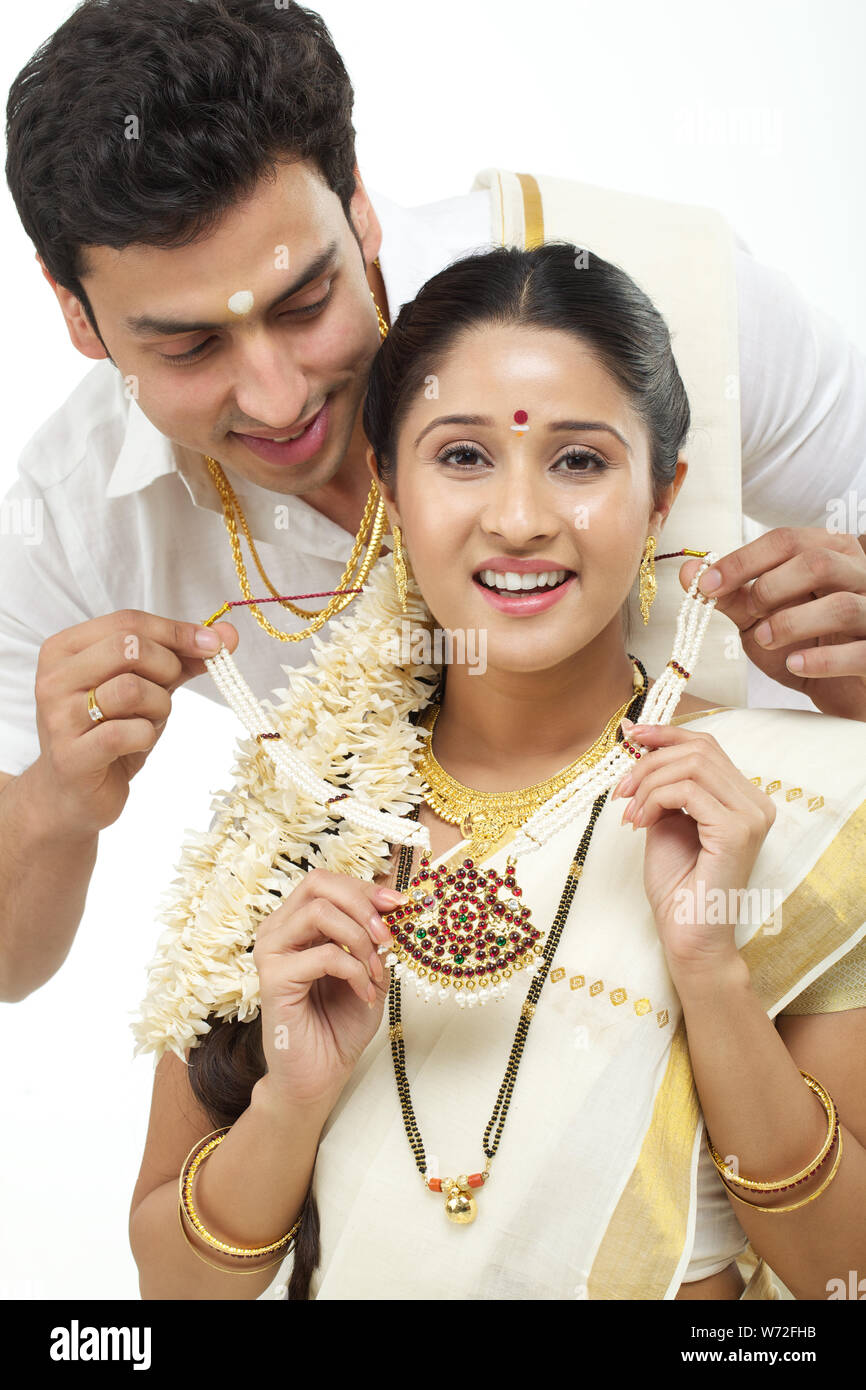 Man giving wife necklace hi res stock photography and images Alamy