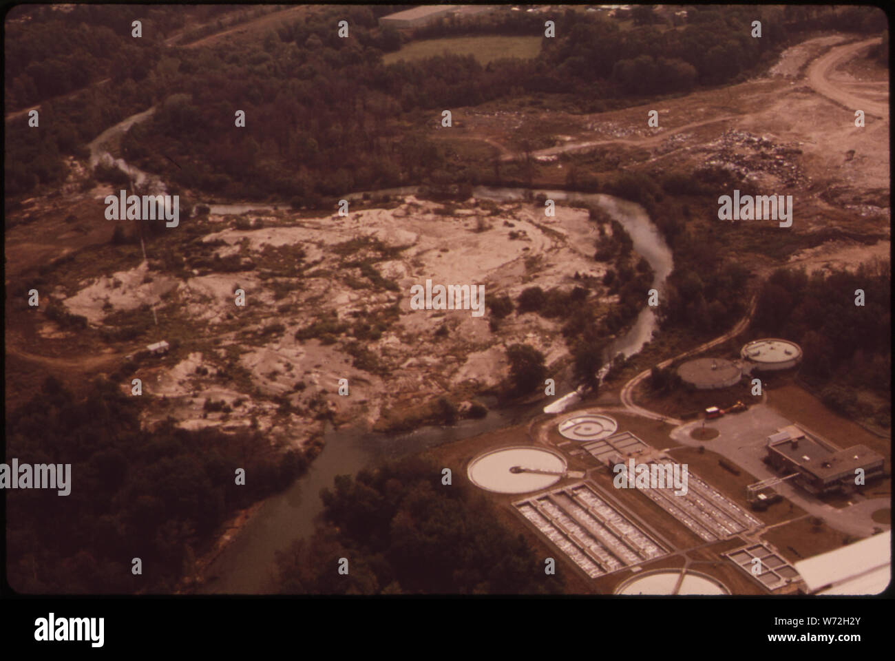 LEOMINSTER TOWN DUMP IS ADJACENT TO THE LEOMINSTER WATER TREATMENT PLANT--ON THE BANKS OF THE NASHUA RIVER Stock Photo