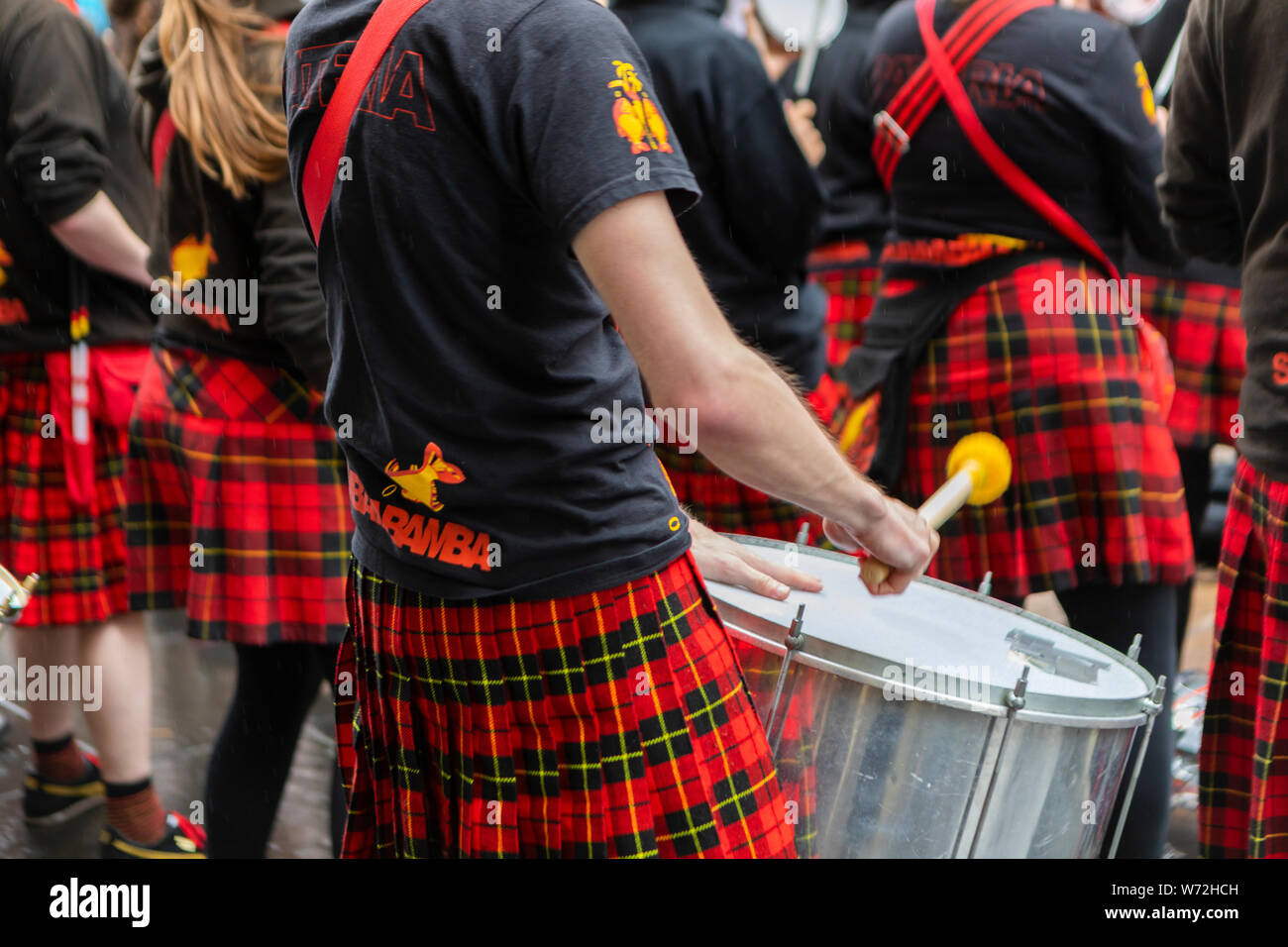 music band with traditional Scottish kilts performing in Glasgow city ...