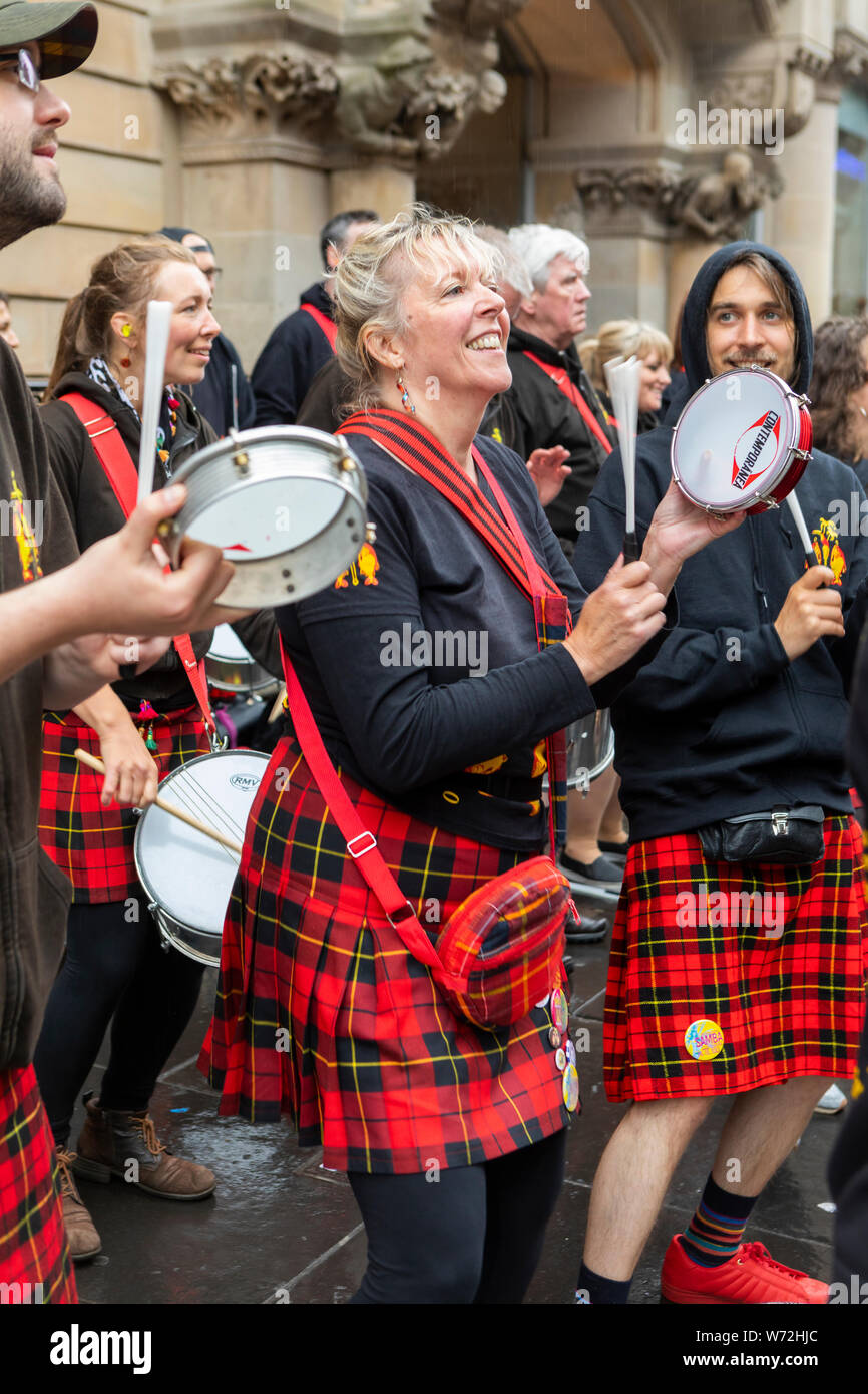music band with traditional Scottish kilts performing in Glasgow city ...