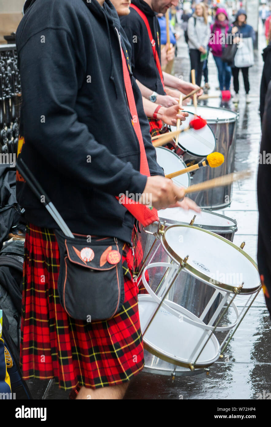 music band with traditional Scottish kilts performing in Glasgow city ...