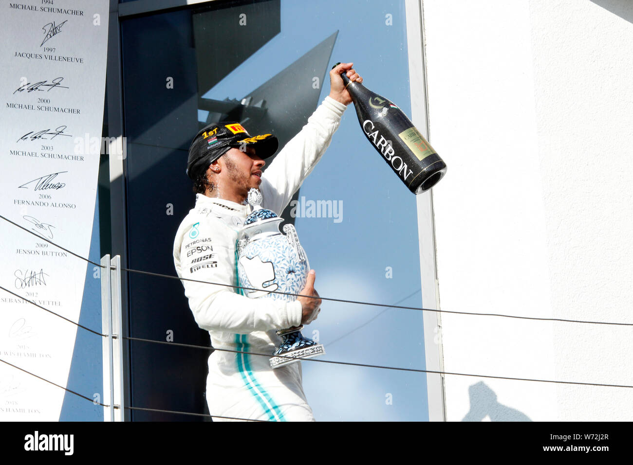 Budapest, Hungary. 04th August,2019.  Race winner Lewis Hamilton of Great Britain and Mercedes GP celebrates on the podium  during the F1 Grand Prix of Hungary Credit: Marco Canoniero/Alamy Live News Stock Photo