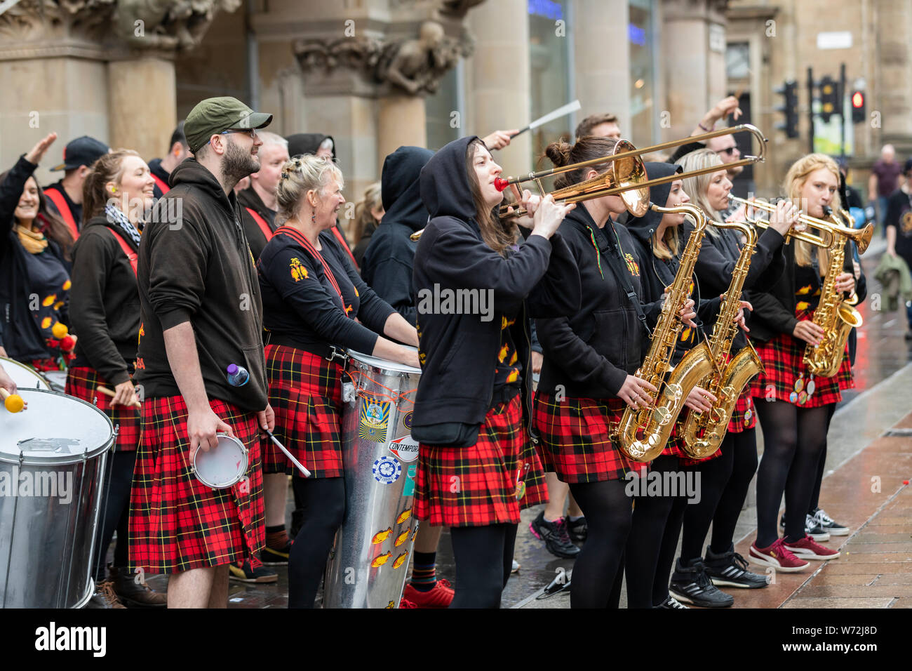 Music Band With Traditional Scottish Kilts Performing In Glasgow City Center Stock Photo Alamy