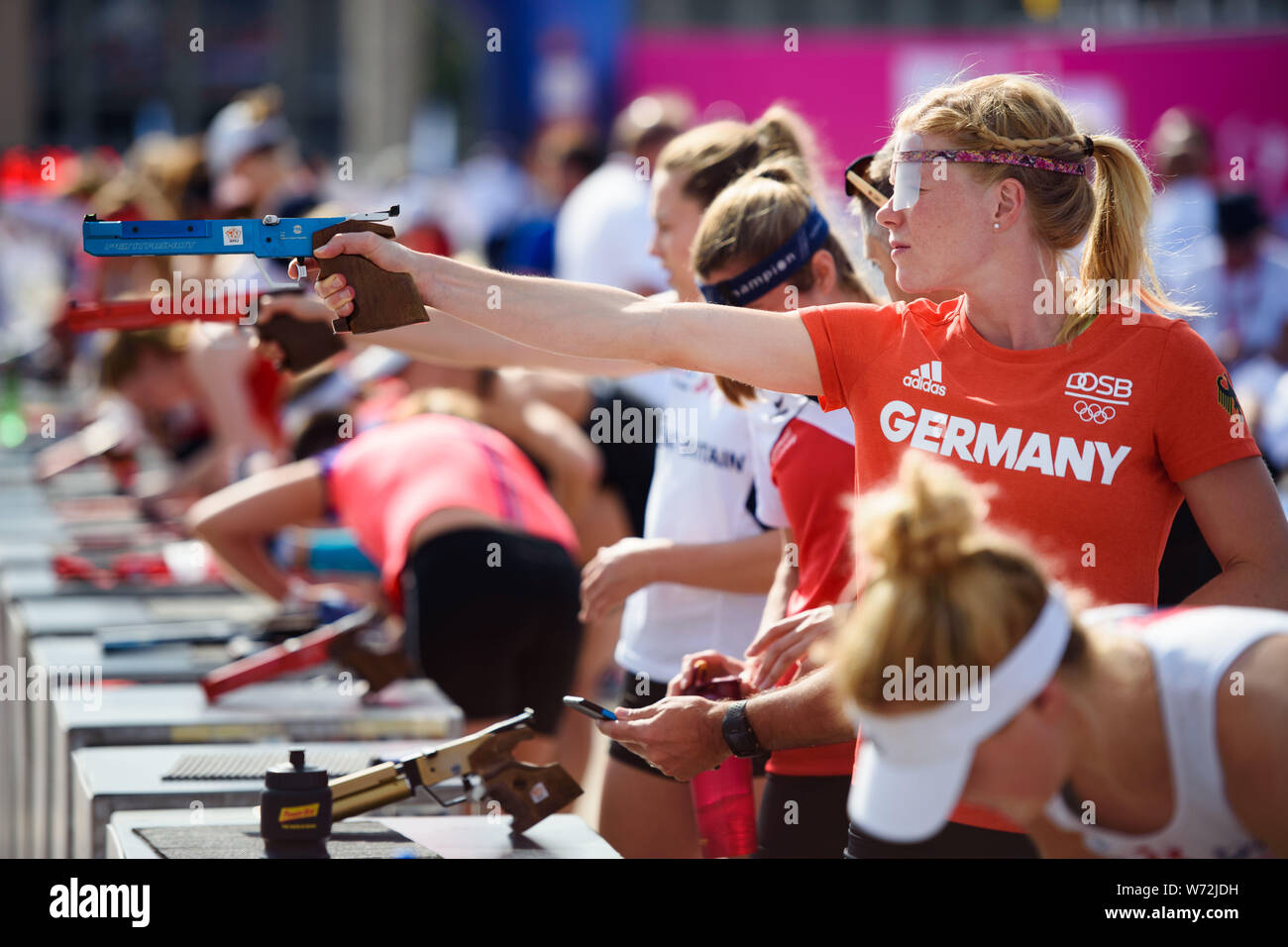 Berlin, Germany. 04th Aug, 2019. Modern pentathlon: German Championship, Laser  Run, Olympic Place. Annika Schleu targets a target with her laser pistol in  her hand during the warm-up phase. Credit: Gregor Fischer/dpa/Alamy