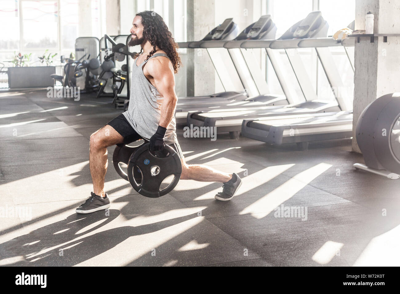 Fit guy long hair hi-res stock photography and images - Alamy