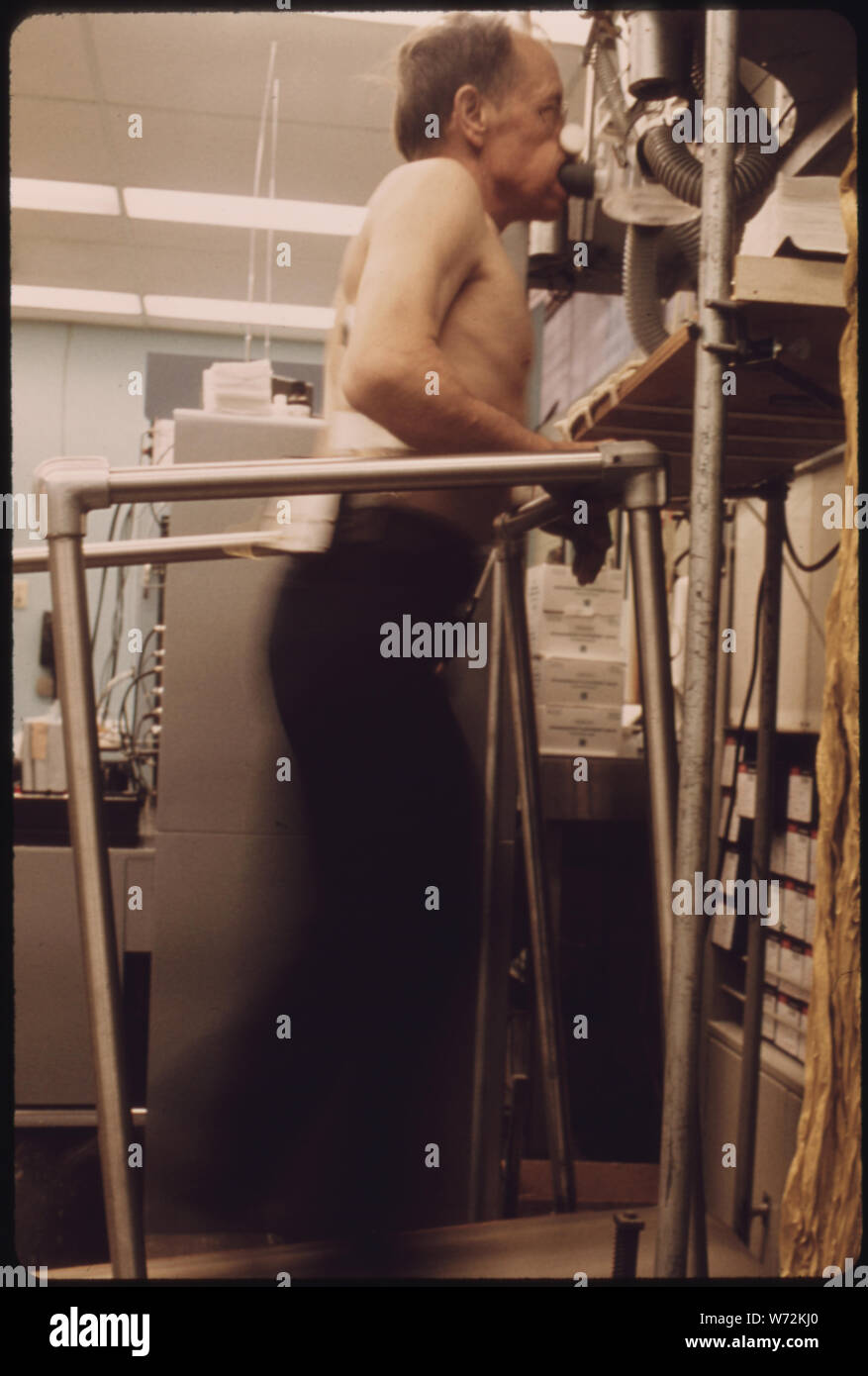 MINER IS HOOKED UP TO A BREATH MACHINE TO MONITOR HOW MUCH LUNG