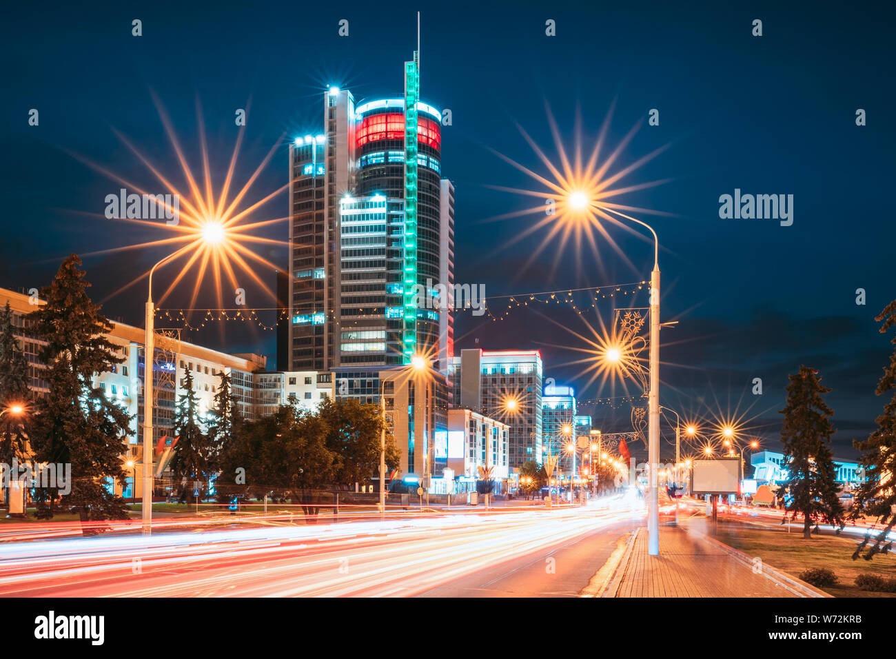 Minsk, Belarus. Night Traffic On Illuminated Street Pobediteley Avenue In Minsk. Stock Photo