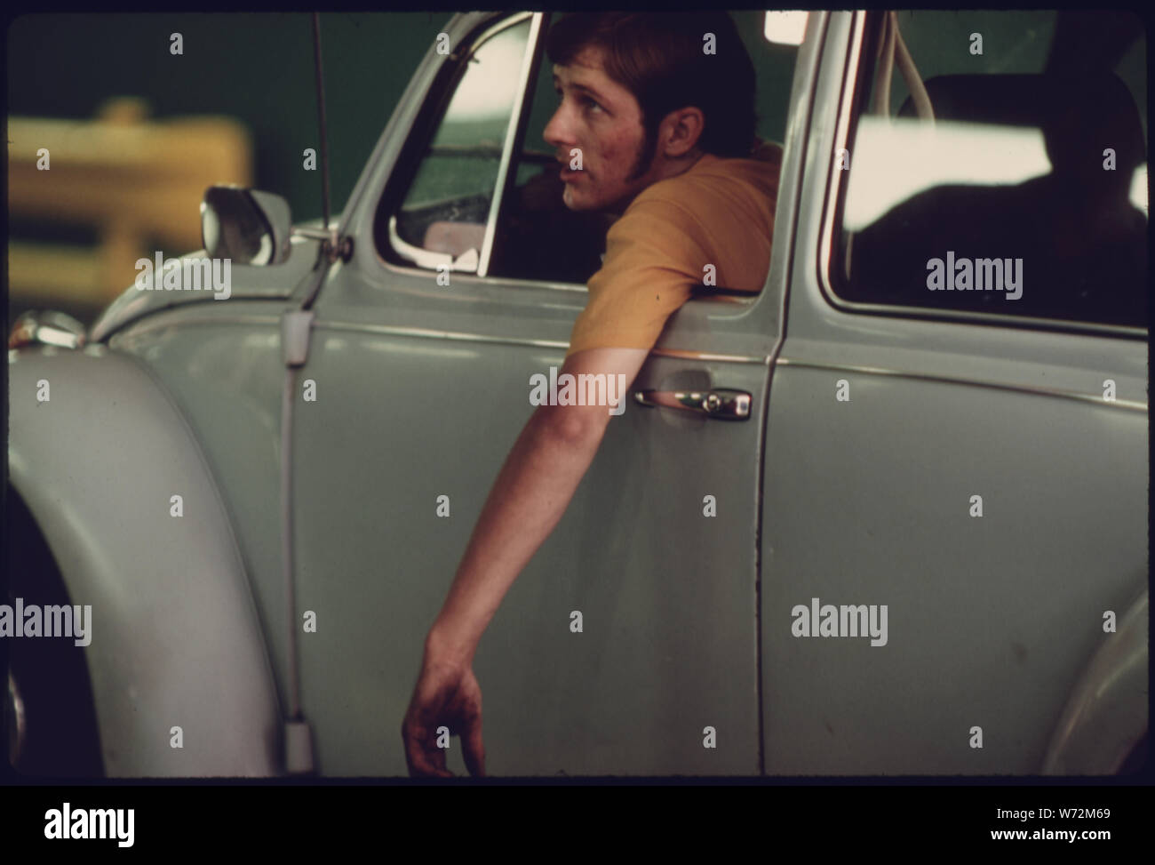 Motorist With Grimy Hands Leads To The Belief He Has Been Working On His Car Prior To Bringing It To An Auto Emission Inspection Station At Norwood Ohio Like All Light Duty