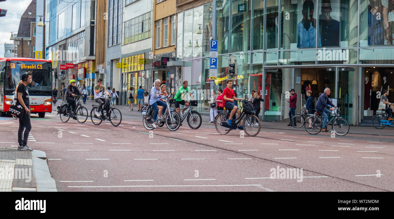 Utrecht Netherlands. July 1st, 2019. People riding bikes in the city center, Spring sunny day Stock Photo